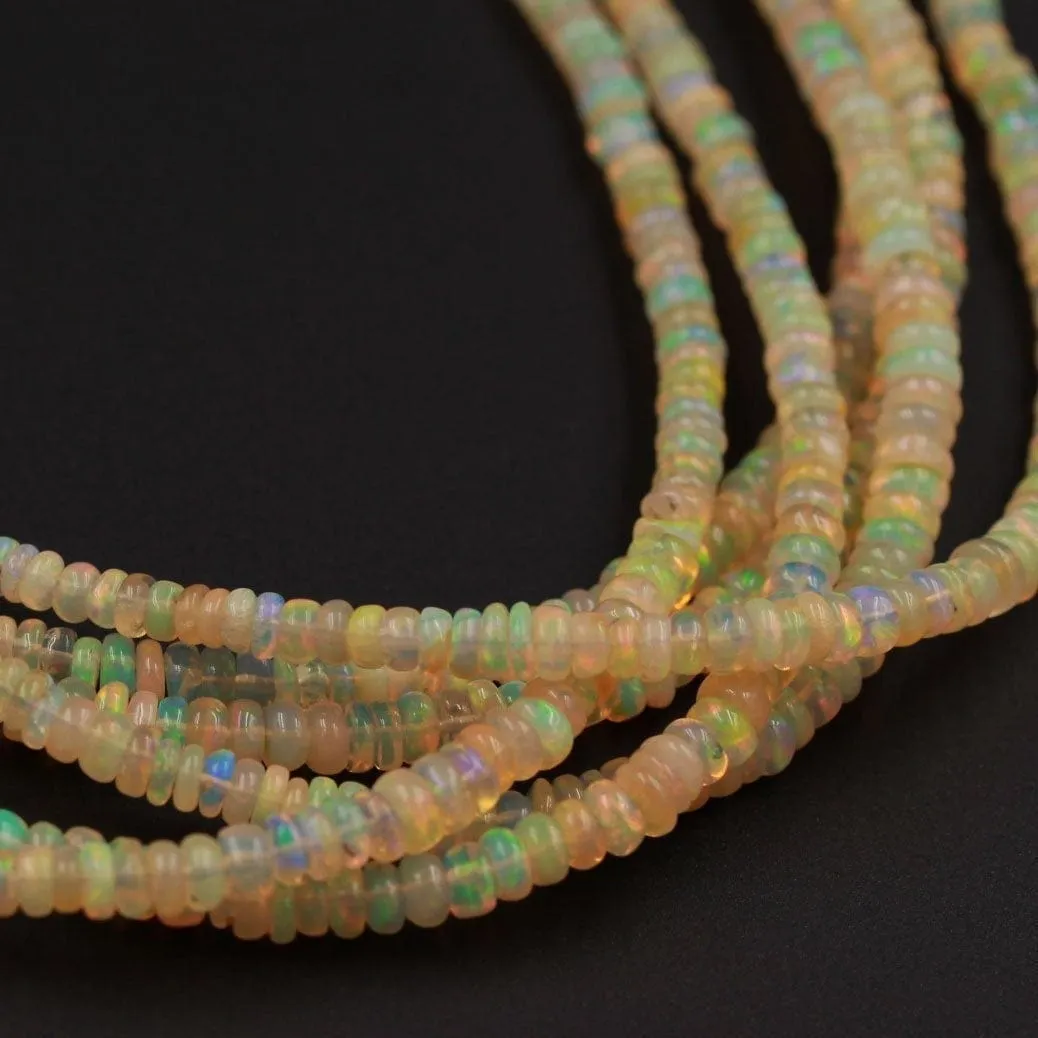 16 Inches Ethiopian Opal Beads Rondelle Graduating 3mm 4mm AAA Super Flashy Fiery Rainbow Yellow Opal Smooth Rondelle Beads 16" Strand