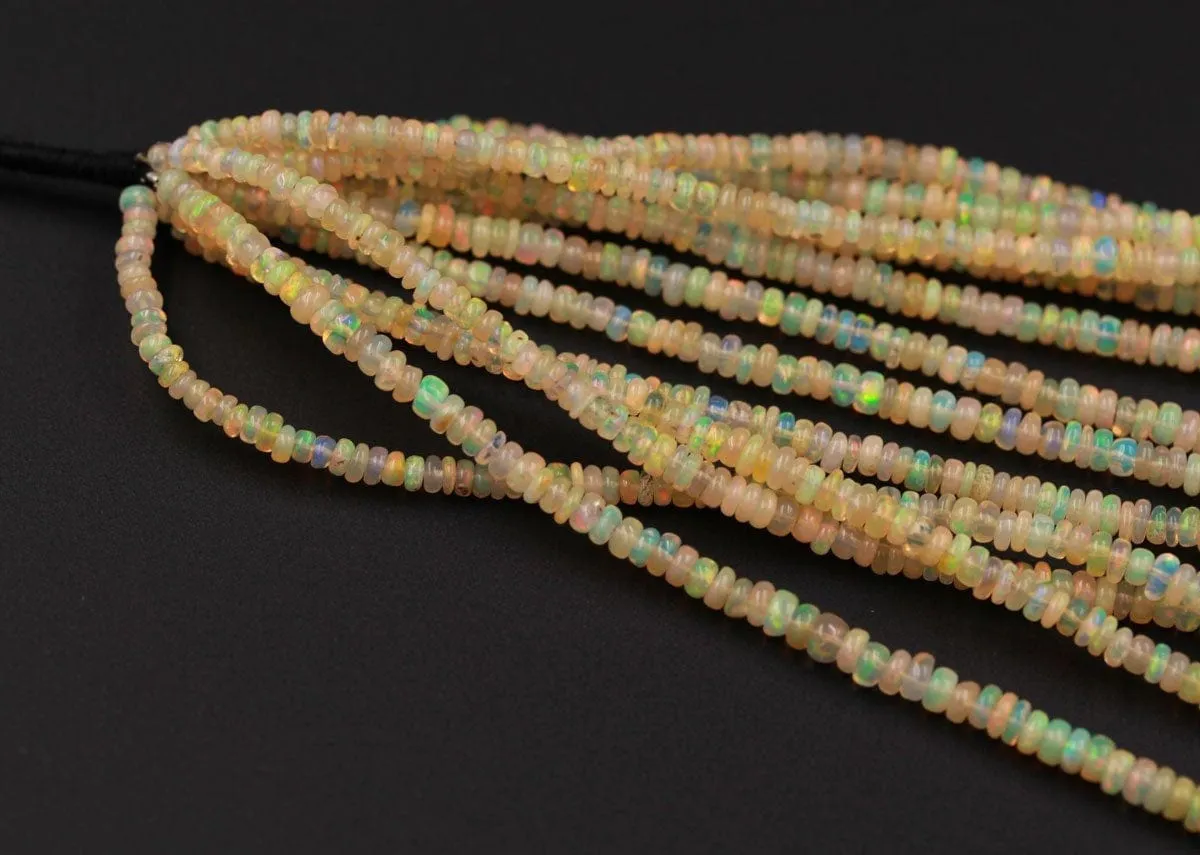 16 Inches Ethiopian Opal Beads Rondelle Graduating 3mm 4mm AAA Super Flashy Fiery Rainbow Yellow Opal Smooth Rondelle Beads 16" Strand