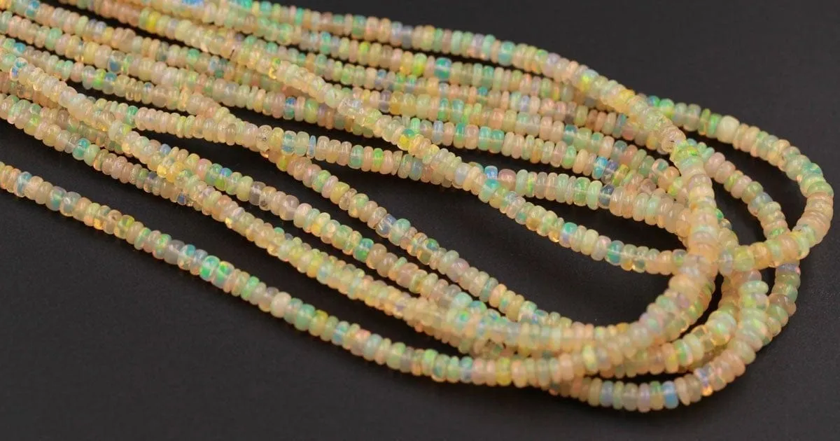 16 Inches Ethiopian Opal Beads Rondelle Graduating 3mm 4mm AAA Super Flashy Fiery Rainbow Yellow Opal Smooth Rondelle Beads 16" Strand