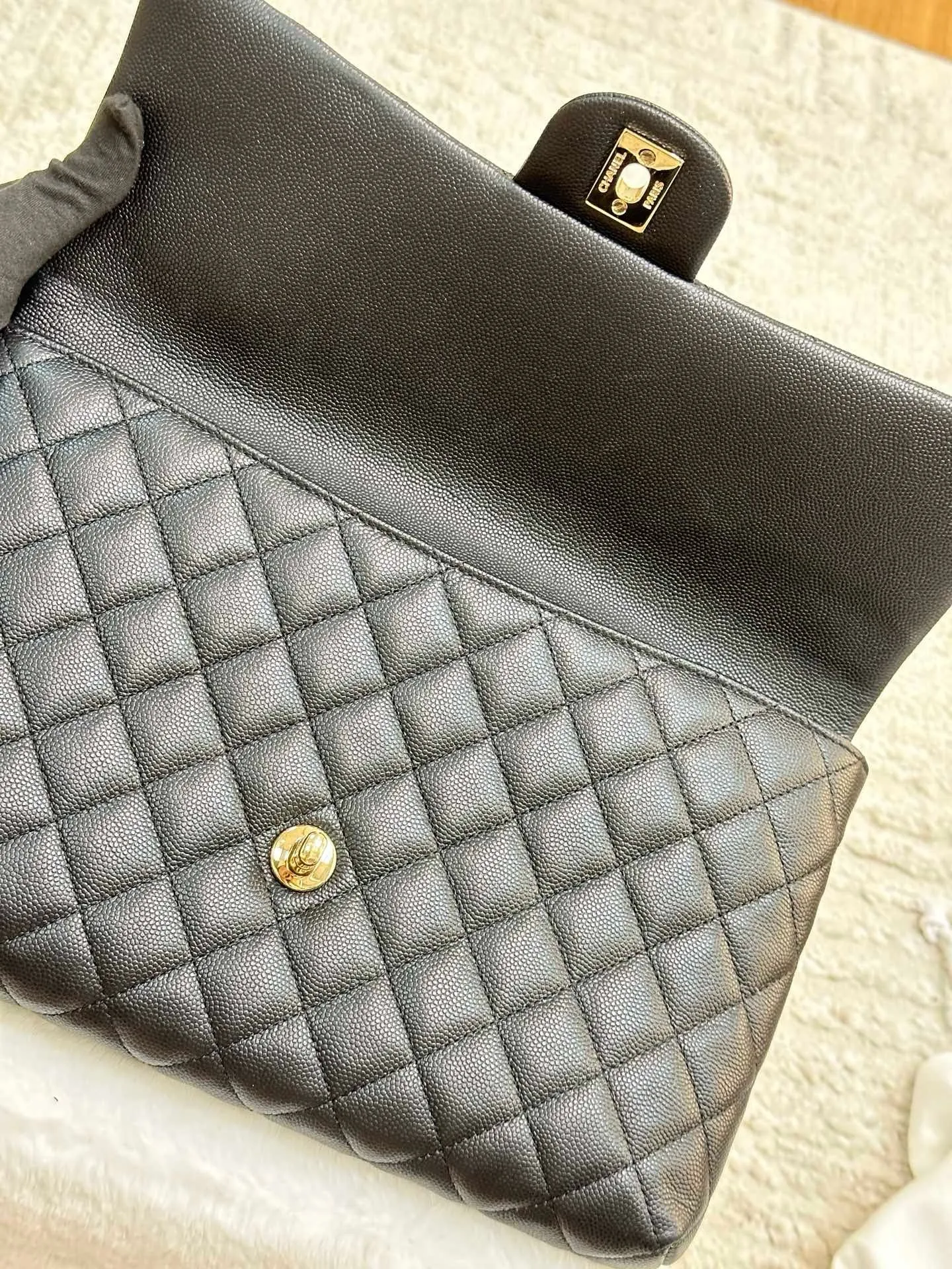 Chanel Quilted Caviar Classic Clutch Black GHW